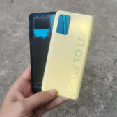 thay nắp lưng realme q3 pro nhựa cứng 2